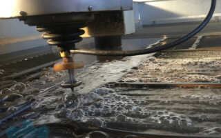 Гидроабразивная резка металла
